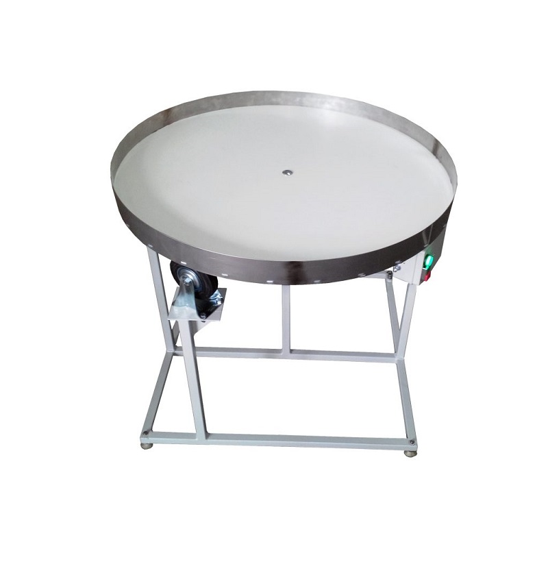 Rotating accumulation table